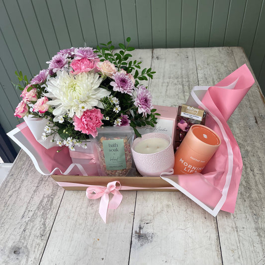 flowers and gifts in a hamper box